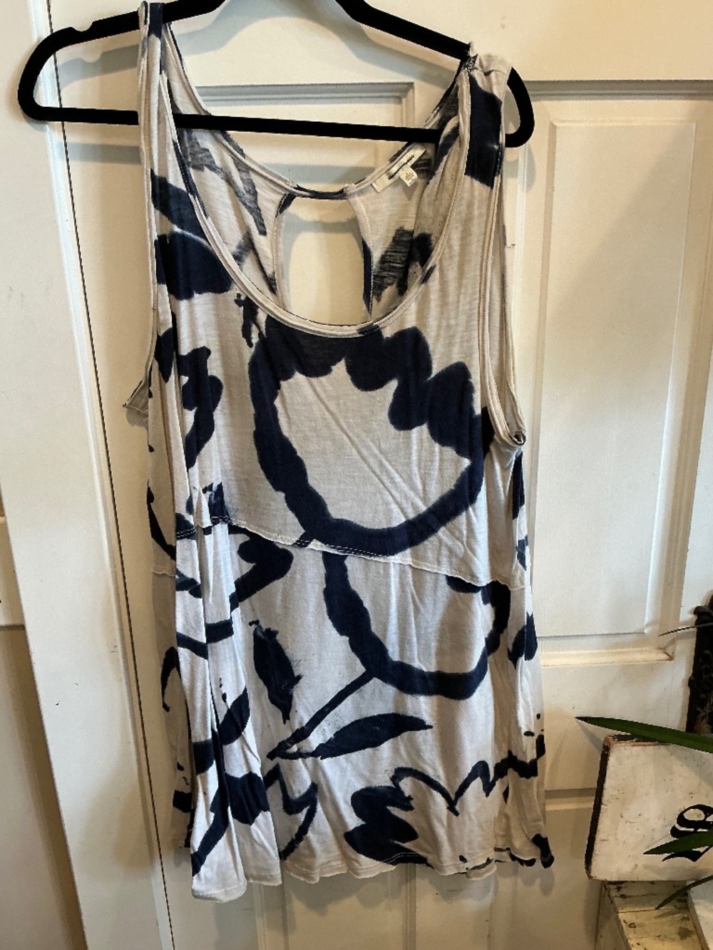 Pure Good sleeveless top with bold floral oversize graphics!  Size large